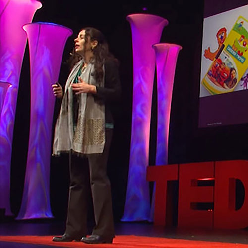 Faculty on stage at TED/X Conference