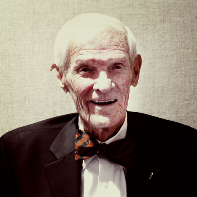Fran Fisher dressed in a tuxedo and bow tie