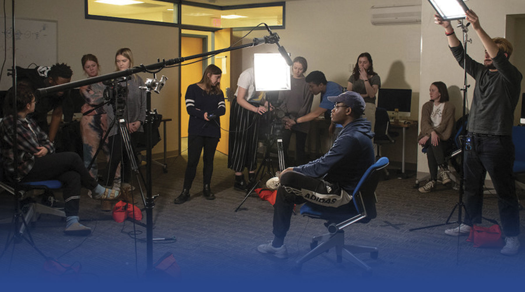 CommAgency students practice setting up video equipment at one of the agency’s routine trainings.