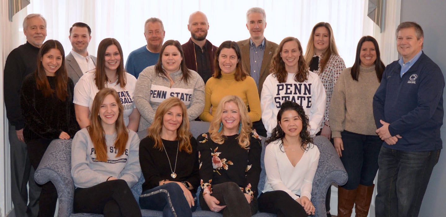 Seventeen members of the Bellisario College Alumni Society Board pose for a photo.