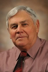 Studio Photo of John Curley in a dress shirt and tie