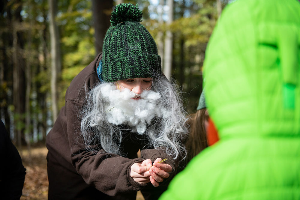 Kid dressed up with a fake beard