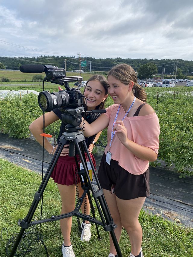Two girls at camera.