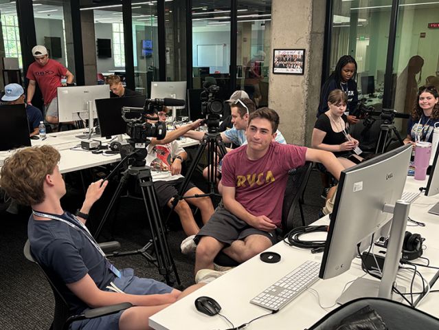 A trio of boys talking