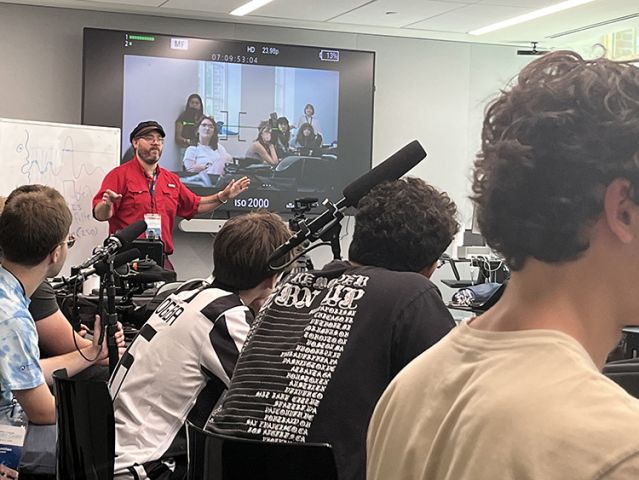 Teacher addressing class