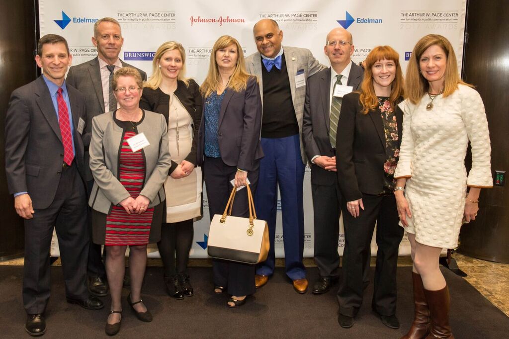 Members of the Johnson & Johnson table pose for a photo at the Page Center Awards.