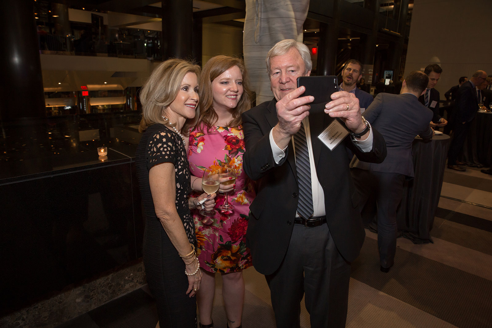 Jill Gabbe (left), Jordan Nielsen and her father Bill Nielsen snap a selfie.