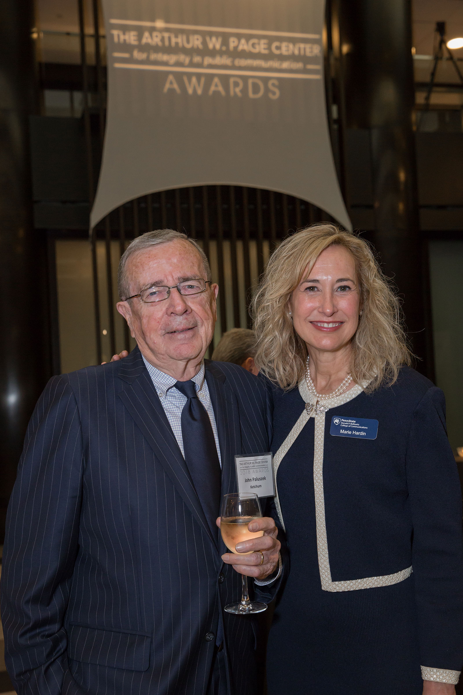 Ketchum's John Paluszek and Penn State's Marie Hardin smile for the camera. 