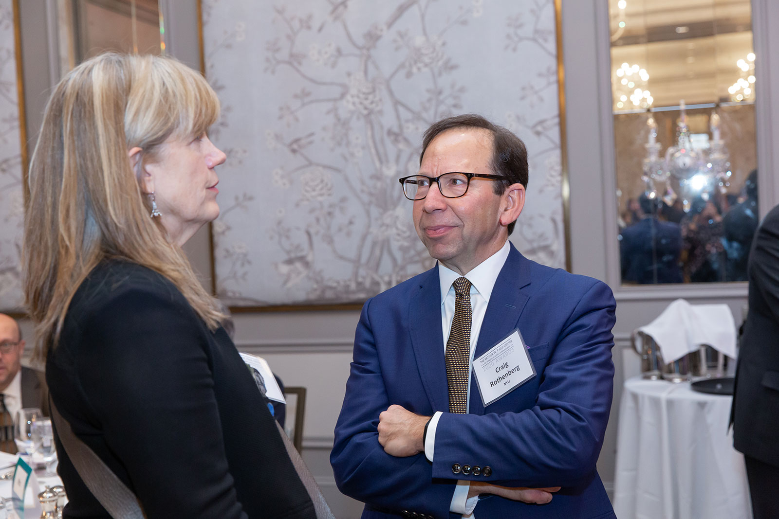  age Center Awards guests network during the cocktail hour. 