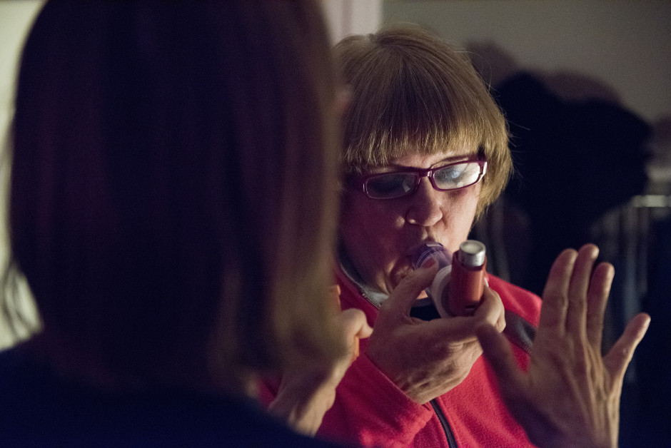 Cindy breathing with an inhaler.