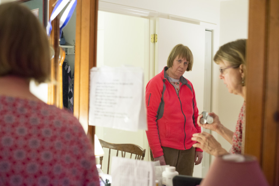 Lisa explaining to Cindy how important taking her medications is for her health.