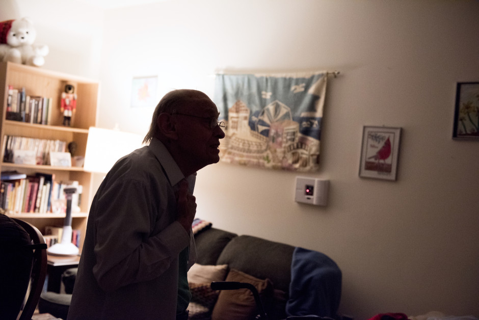 Stanley prepares to go to bed, walking across his bedroom